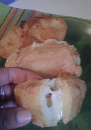 Una foto de Papas con queso