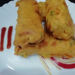 A picture of Bread Pakora Rolls.
