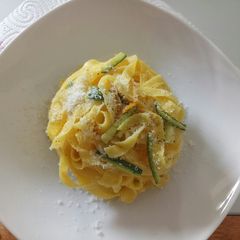A picture of Tagliatelle with an orange aroma.