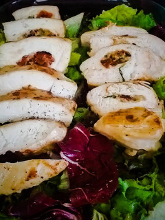 A picture of Chicken breast with basil and sundried tomato.