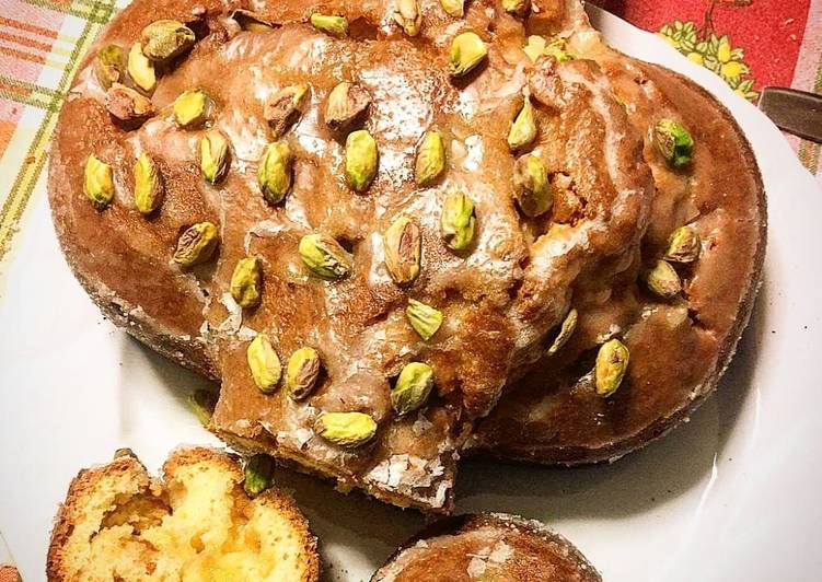 Step-by-Step Guide to Prepare Favorite Colomba molto casalinga farcita al limone ed arancio, copertura al limone e pistacchi