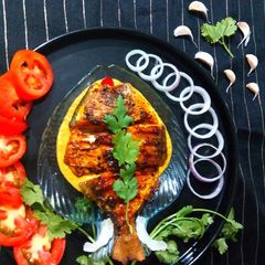 A picture of Grilled Pomfret with Mustard Coconut Sauce.