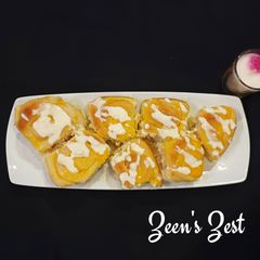 A picture of Cinnamon Rolls with Lemon Custard and Cream Cheese.