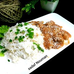 A picture of Sesame chicken with garlic rice.