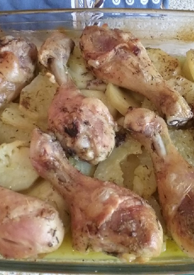 Una foto de Muslitos de pollo al horno