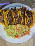 Mini tacos de deshebrada preparada
