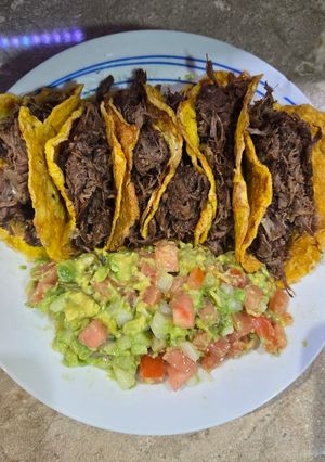 Una foto de Mini tacos de deshebrada preparada
