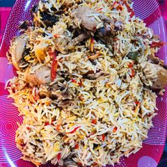 A picture of Chicken desi biryanibakra eid meaty.