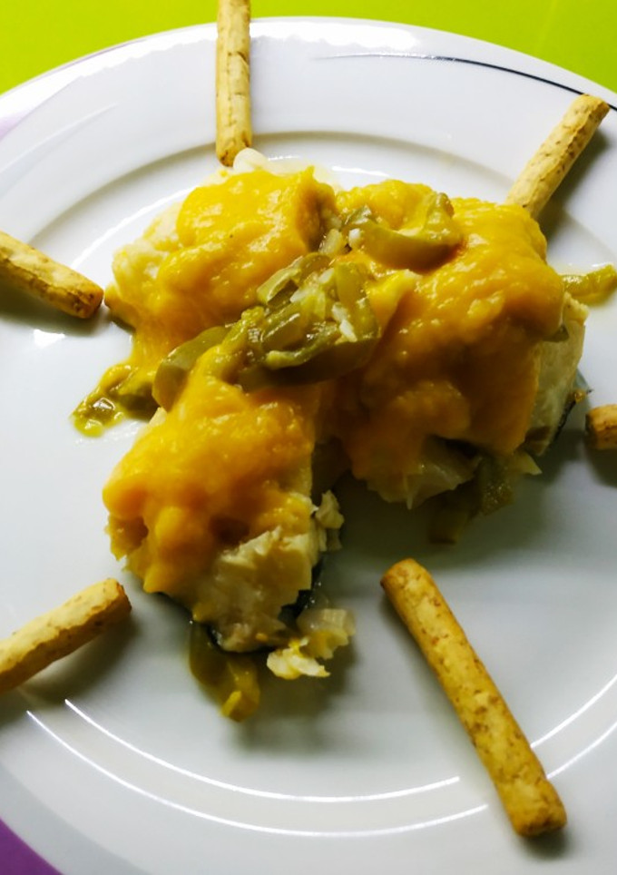 Una foto de Lomos de bacalao con salsa de calabaza