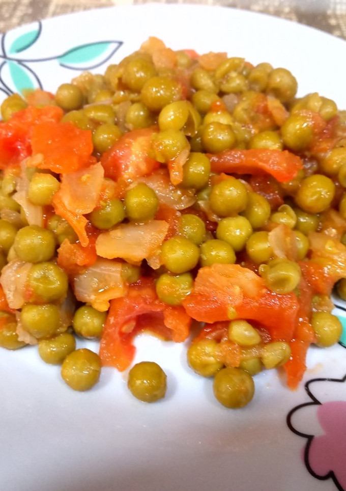 Una foto de Guisantes con sofrito de tomate