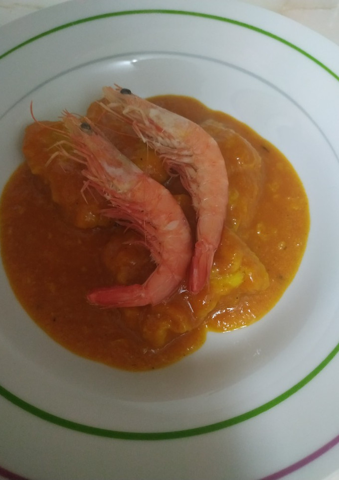 Una foto de Pescada en salsa