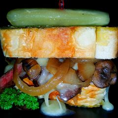 A picture of Mike's Steak Cheese Onion & Mushroom Man-wich.