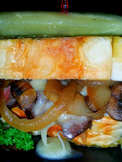 A picture of Mike's Steak Cheese Onion & Mushroom Man-wich.