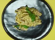 Una foto de pasta con salsa carbonara