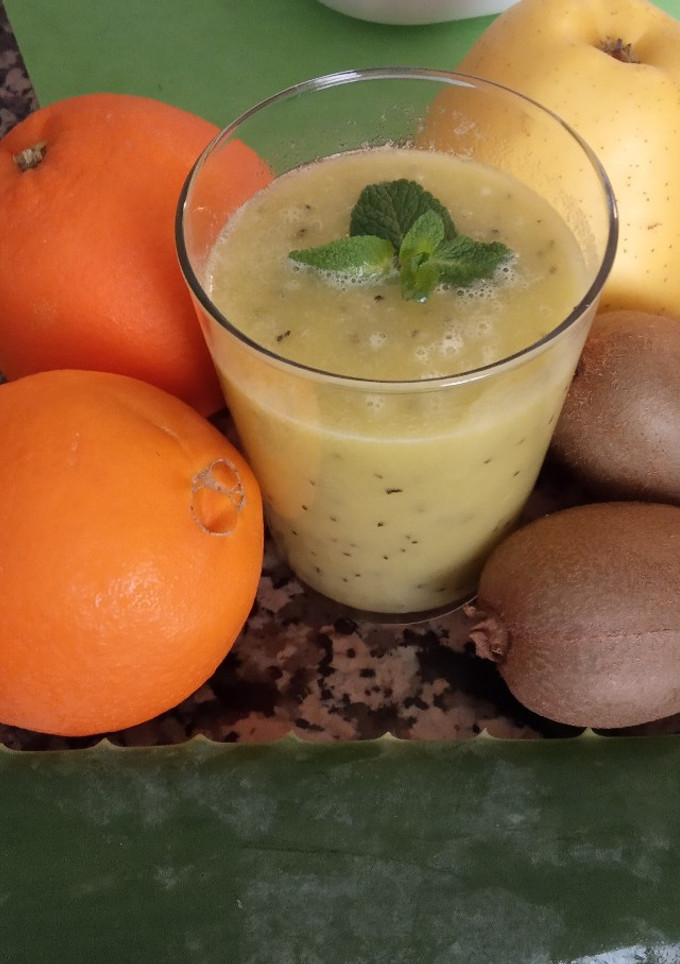 Una foto de Zumo de kiwi, manzana y naranja