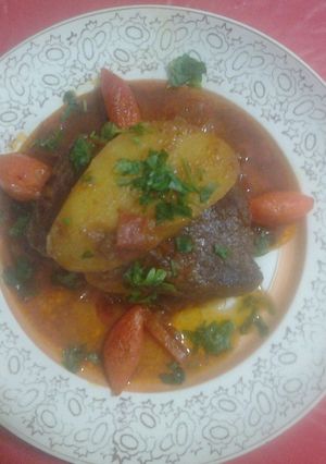 Una foto de Bife a la criolla