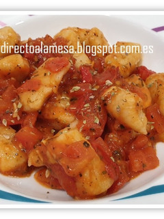Una foto de Ñoquis con salsa de tomate