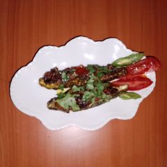 A picture of Stuffed bitter gourd 🥭🌶️🌿.