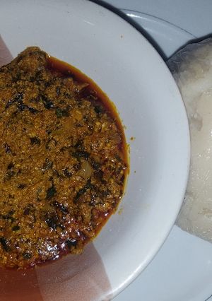 A picture of Egusi soup with ugu and bitter leaf.