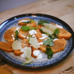 A picture of Roasted butternut squash with lime sauce.