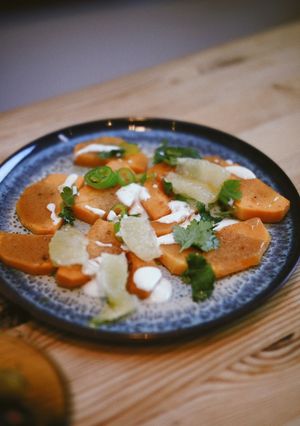A picture of Roasted butternut squash with lime sauce.