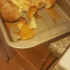A picture of Garlic parmesan cheese stuffed breadsticks.