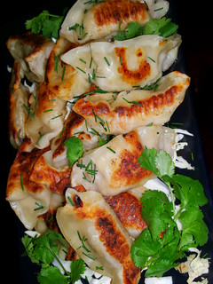 A picture of Mike's Pan Seared Pork Wontons Or Pork Pot Stickers.