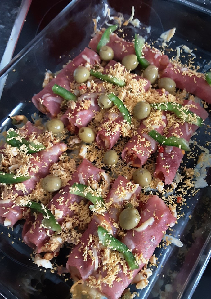 Una foto de Rollitos de jamón York al horno