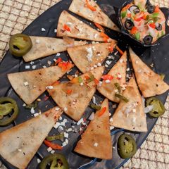 A picture of Chapati tortilla with BBQ dip.