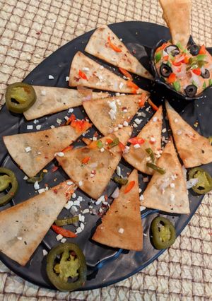A picture of Chapati tortilla with BBQ dip.
