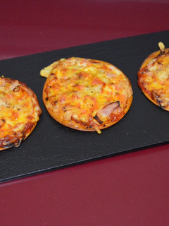 Una foto de Mini pizzas caseras