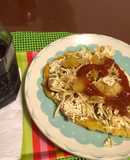 Patacón relleno con pollo y papas ripio
