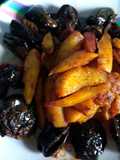 Masala brinjal and fried potato wedges