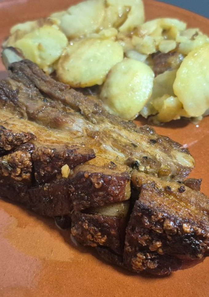 Una foto de Costilla de cerdo al horno