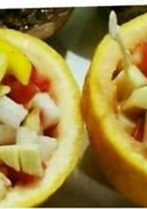 A picture of Grape Fruit stuffed salad💛🍈🍋🍊🍀.