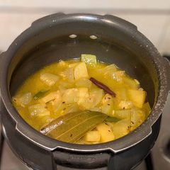 Bengali niramish Lauer dalna (Bengali Bottle Gourd curry without onion and garlic) A picture of Bengali niramish Lauer dalna (Bengali Bottle Gourd curry without onion and garlic).