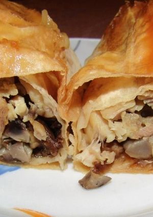 Фото Рулеты из лаваша с курицей, грибами и сыром.