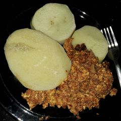 A picture of Boiled yam and egg stew.