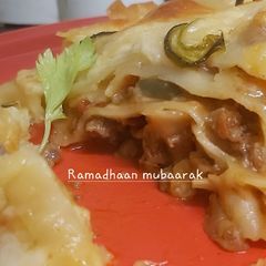 A picture of Lasagna with mince beef.