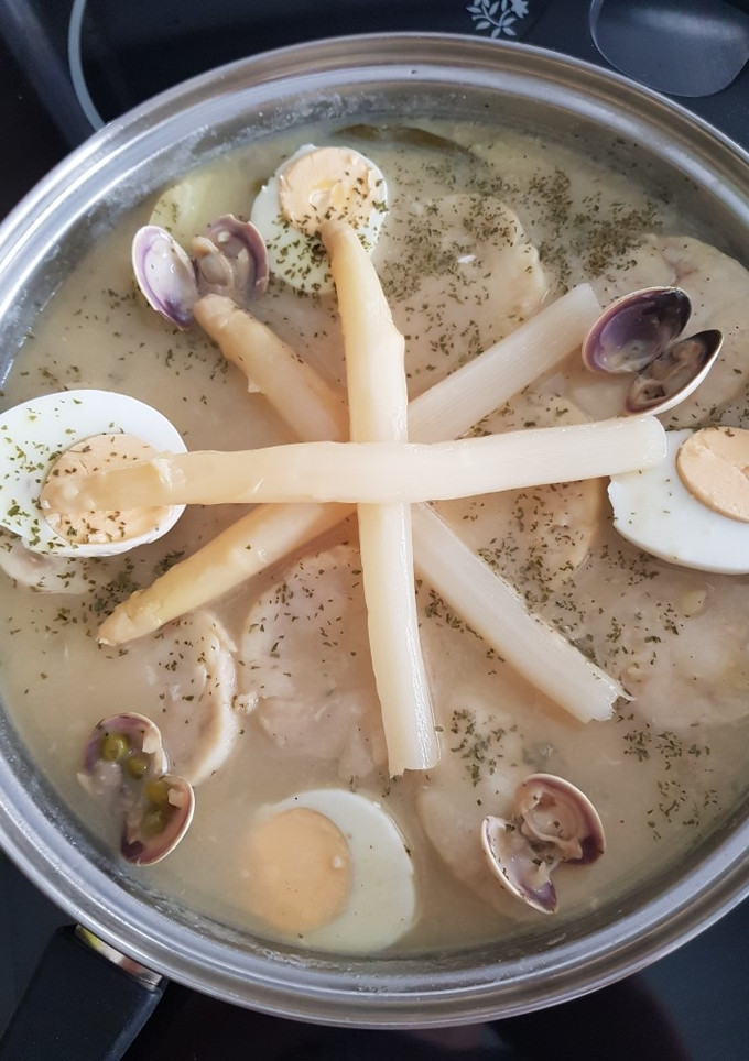 Una foto de Merluza en salsa verde