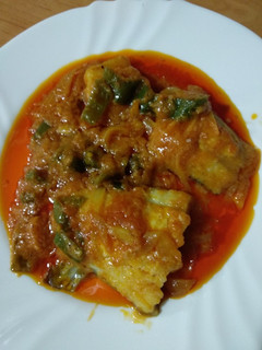 Una foto de Bacalao con tomate