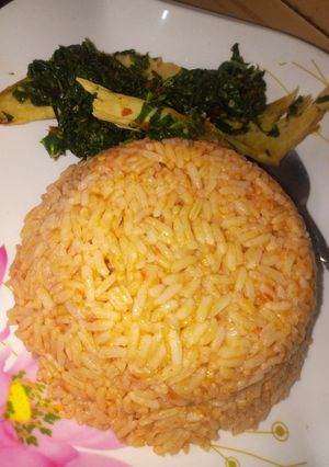 A picture of Jallof rice with spinach.