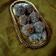 A picture of Condensed milk mix pineapple laddu.