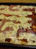 Pizza casera con salsa putanesca