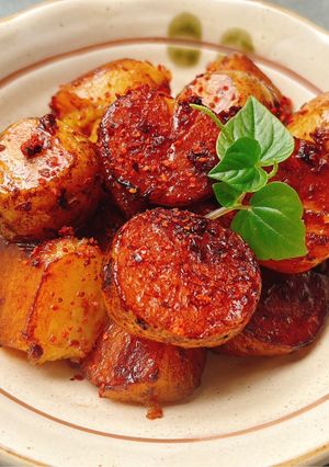 Hình của món Khoai tây rim hắc xì dầu.