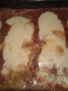 Una foto de Pizza rellena de berenjena y zucchini