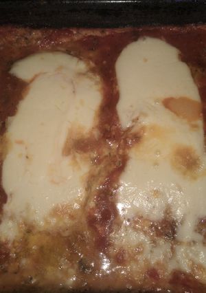 Una foto de Pizza rellena de berenjena y zucchini