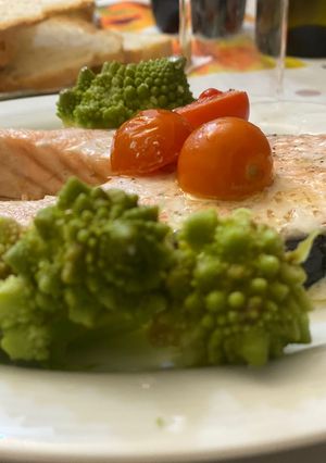 A picture of Baked Salmon with Cherry Tomatoes, Garlic, Olive Oil, and Parsley.