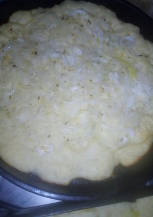 Una foto de Pizza de cebolla