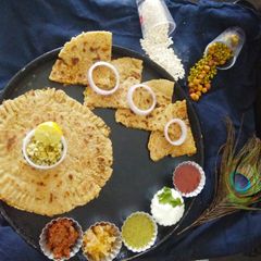 A picture of Sprouts veg curd stuffed paratha of Oats.